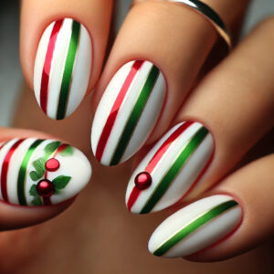 A close-up of almond-shaped nails with a festive candy cane stripe design. The nails feature alternating red and white stripes, resembling a classic candy cane, with a glossy finish. Some nails are accented with solid red or white for added contrast. The playful and bold design captures the spirit of the holiday season, offering a fun and festive look. The background is softly blurred to keep the focus on the nails.